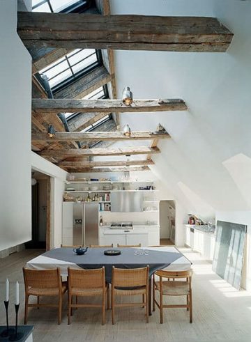 dining room with wooden beams