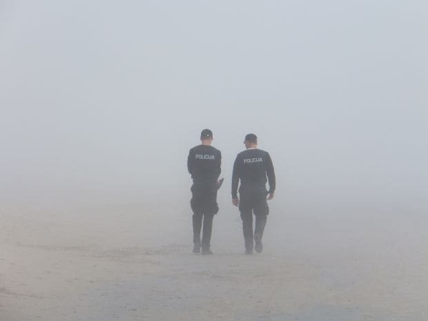 men in fog